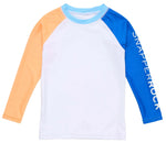 The Boys' Blue Papaya LS Rash Top by Snapper Rock features a white body, orange left sleeve, blue right sleeve with "SNAPPERROCK" text, light blue neckline, and UPF50+ sun protection.