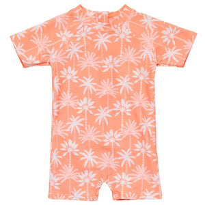 The Snapper Rock Baby Boys' Cali Palms Recycled SS Sunsuit is a peach short-sleeve romper with a white palm tree print, front zipper, and snap leg closures—crafted from recycled fabric for comfort and style.