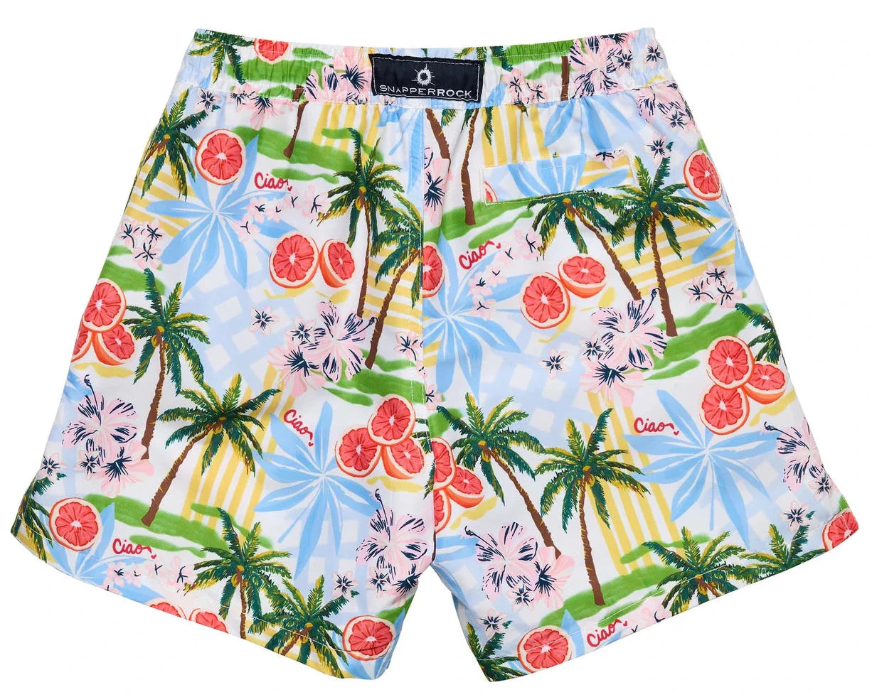 Snapper Rock Boys' Ciao Paradiso Swim Short is made from recycled fabric with a tropical print—palm trees, grapefruits, blue bows, and "Ciao" on a light background—and provides UPF50+ sun protection for all-day fun.