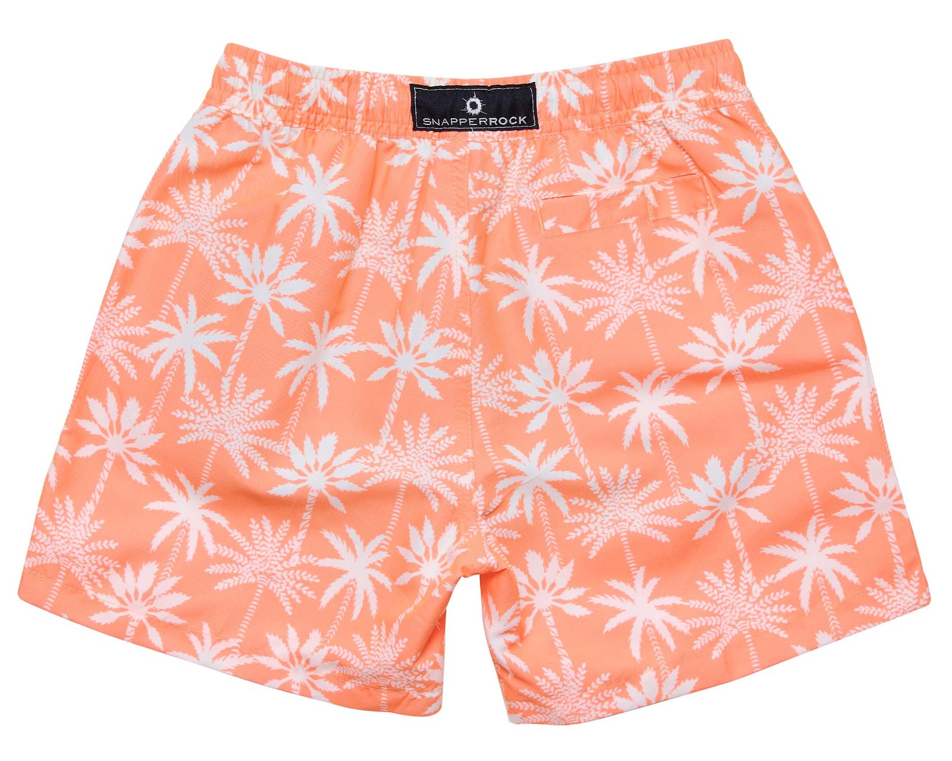 The Boys' Cali Palms Recycled Swim Short by Snapper Rock features orange fabric with white palm trees, elastic waistband, back pocket, brand label, soft liner, and offers UPF50+ sun protection for comfortable all-day wear.