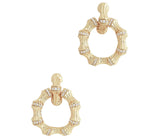 Anabel Aram Bamboo Double Hoop Earrings made of gold-plated brass shaped like bamboo with crystal pavé at the joints.