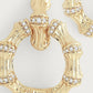 Bamboo Double Hoop Earrings in gold-plated brass with a bamboo-textured design and crystal pavé accents.