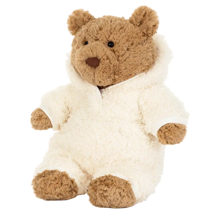The Jellycat Bartholomew Bear wears the cozy Bartholomew Bear All-in-One Outfit, sitting slightly left against a white background—an adorable pick for hibernation-season lounging.