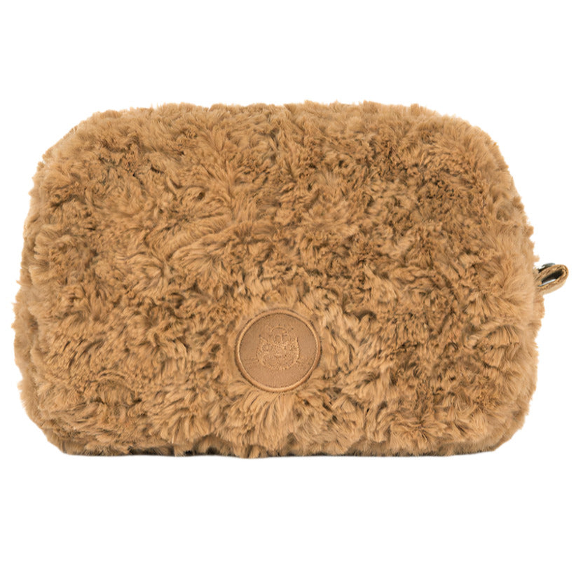 The Jellycat Bartholomew Bear Pouch is a rectangular, light brown faux fur pouch with a circular leather patch and side zipper—perfect for Bartholomew Bear fans.