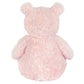 The Jellycat Leola Bear Medium is a fluffy pink artist bear, shown from the back with its head, ears, arms, and body visible against a white background—crafted with care in a South London studio.