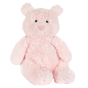 The Jellycat Leola Bear Medium is a soft, light pink bear with black eyes and a light pink nose, sitting upright against a plain white background. Designed in a South London studio.