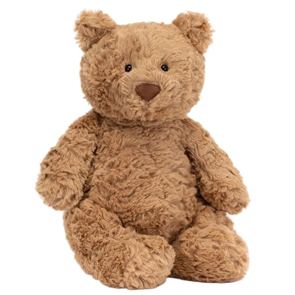 The Jellycat Bartholomew Bear Huge is a soft, light brown bear with a round nose and black button eyes, shown sitting upright against a white background.