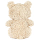 A Bartholomew Bear Junior by Jellycat is shown in beige, fluffy fur, facing away from the camera to display its back, ears, and arms.
