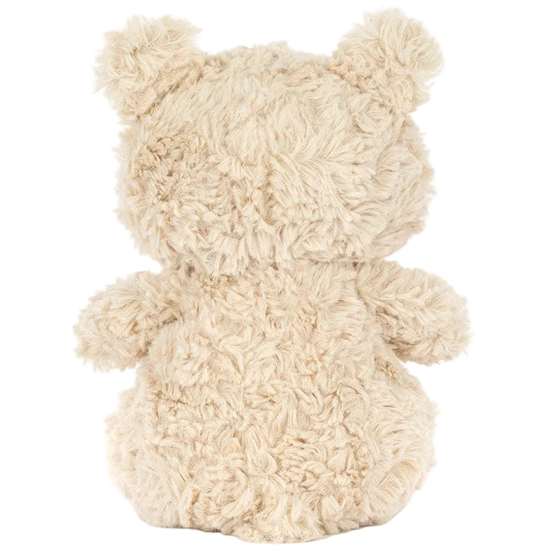 A Bartholomew Bear Junior by Jellycat is shown in beige, fluffy fur, facing away from the camera to display its back, ears, and arms.