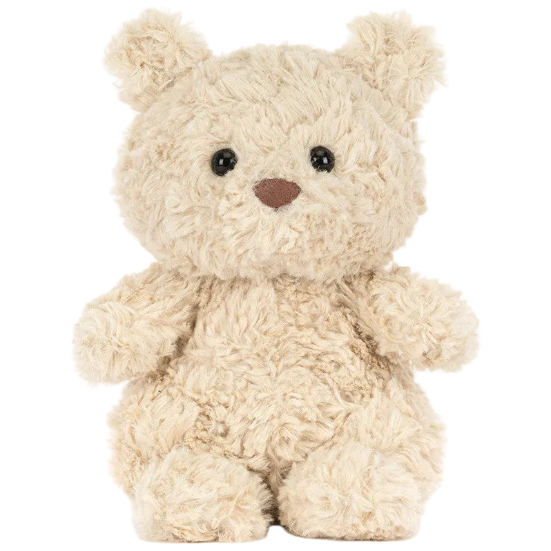 A beige, fluffy plush toy named Bartholomew Bear Junior from Jellycat sits facing forward against a white background.