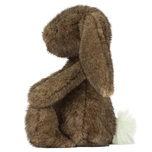 The Jellycat Hoppleston Luxe Bunny Original plush sits upright in side profile, highlighting its long floppy ears and fluffy white tail against a plain white background.