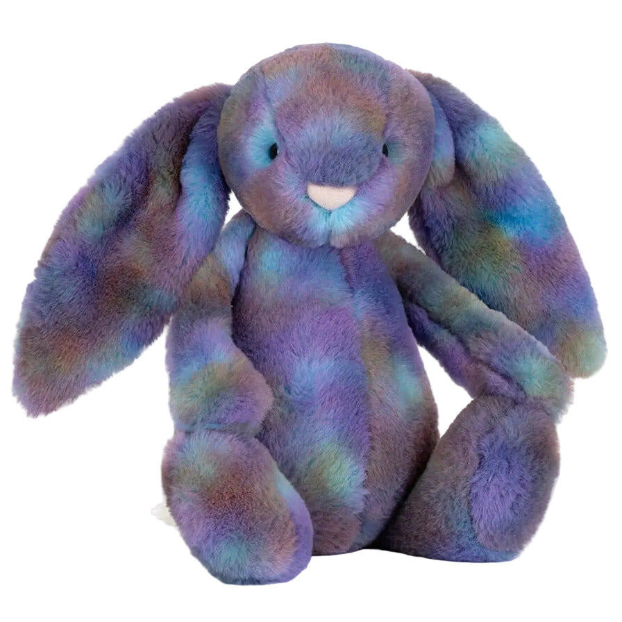 The Jellycat Zodihop Luxe Bunny plush toy features long floppy ears, ultra-soft fur with a cosmic pattern in mottled purple, blue, and green shades, and sits upright.