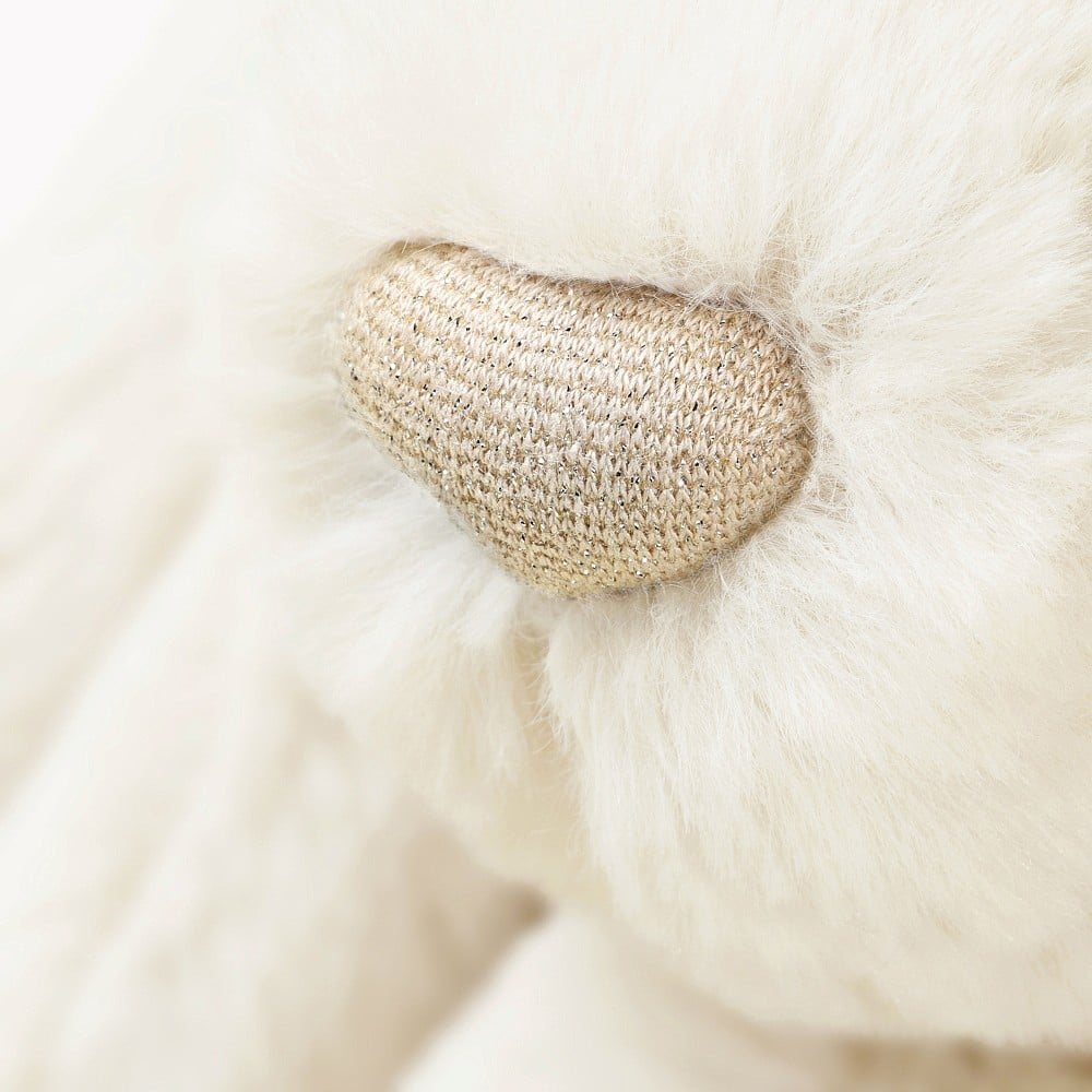 Bashful Luxe Bunny Luna, a white stuffed bunny designed by Jellycat, sitting on a white background.