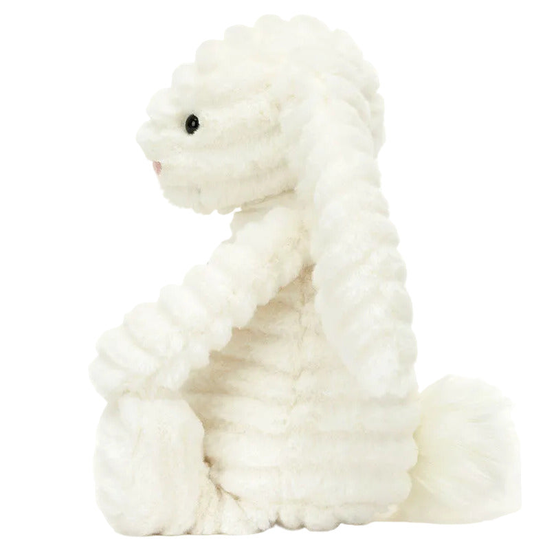 The Jellycat Bashful Luxe Bunny Nimbus is a plush white toy with textured fur, floppy ears, and a fluffy tail—ideal for collectors.