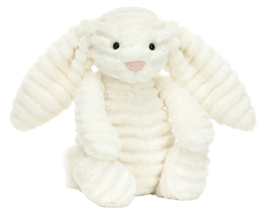 Bashful Luxe Bunny Nimbus by Jellycat features long floppy ears, black eyes, a pink nose, and textured fur, sitting upright against a white background.
