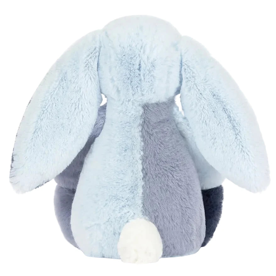 The Jellycat Puddlesea Bunny plush toy features soft light blue and gray fur, long floppy ears, and a tiny white tail—perfect for cozy cuddles after beachside playtime.