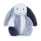 The Jellycat Puddlesea Bunny plush toy features soft light and dark blue fabric, long floppy ears, and an upright pose—ideal for cuddling or pairing with beach toys for imaginative play.