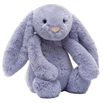 The Jellycat Bashful Viola Bunny is a grey plush toy with long floppy ears, black eyes, and a light pink nose, sitting upright against a white background.