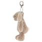 Side view of the Jellycat Bashful Beige Bunny Bag Charm, a cute plush keychain with long ears and a white tail, featuring a metal clasp for easy attachment.