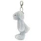 A side view of the Jellycat Bashful Silver Bunny Bag Charm shows its gray plush texture, long ears, and silver clasp. This Jellycat accessory doubles as a charming adventure companion when on the go.