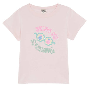 The Girls' Bring Me Sunshine Tubo T-Shirt by Bonton blends light pink style and 100% cotton softness with “BRING ME SUNSHINE” text and a playful flower-shaped sunglasses graphic on the front.