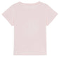 The Bonton Girls' Bring Me Sunshine Tubo T-Shirt, shown from the back against a white background, features a light pink hue and is crafted from 100% cotton for softness.
