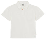 The Bonton Boys' Livio Polo is a plain white cotton shirt with a collar, three buttons, and a chest pocket, laid flat on a white background—ideal for a classic summer look.