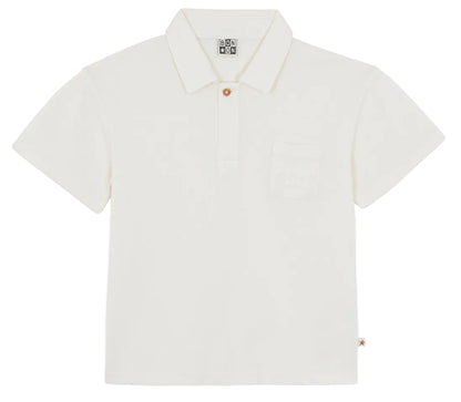 The Bonton Boys' Livio Polo is a plain white cotton shirt with a collar, three buttons, and a chest pocket, laid flat on a white background—ideal for a classic summer look.
