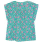 The Girls' Lorelei Shirt by Bonton is a short-sleeve top made from 100% cotton with an all-over pink and green floral pattern and blue accents, shown flat on a white background.