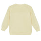 Back view of the Boys' Paradise Sweatshirt by Bonton in light yellow, featuring ribbed cuffs and hem for comfort; crafted from soft cotton for all-day wear.
