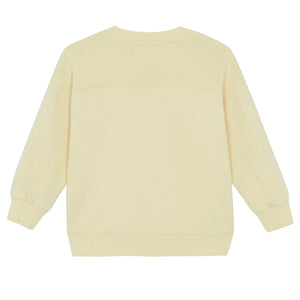 Back view of the Boys' Paradise Sweatshirt by Bonton in light yellow, featuring ribbed cuffs and hem for comfort; crafted from soft cotton for all-day wear.