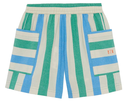 Green, blue, and beige vertically striped cotton Boys’ Lois Short by Bonton, featuring two large front pockets and the initials “B.T.N” embroidered on the right pocket. These shorts also have an elastic waist for a comfortable fit.