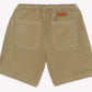 Bonton Boys’ Lyon Short shown from the back, featuring two square pockets and an elastic waistband with a small brown label above the right pocket—introducing this comfortable and stylish cotton design.