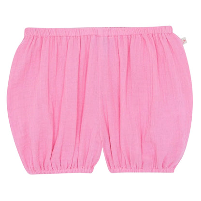 Baby Girls' Bombe Bloomer by Bonton: loose-fitting cotton shorts with an elastic waistband and leg openings, shown on a white background.