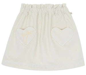 The Girls' Douchka Skirt by Bonton has an elastic waistband, heart-shaped front pockets, and a small palm tree design, all in charming ecru.