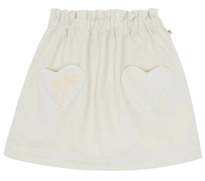 The Girls' Douchka Skirt by Bonton has an elastic waistband, heart-shaped front pockets, and a small palm tree design, all in charming ecru.