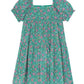 The Bonton Girls' Georgette Dress features a green floral print, short puff sleeves, square neckline, and a loose tiered silhouette—ideal for breezy summer days.