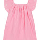 The Baby Girls' Revebb Dress by Bonton is a pink, short-sleeved cotton gauze dress with ruffled sleeves and delicate white embroidered accents, from the Coco Chill collection.