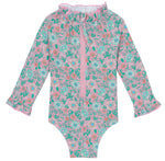 The Bonton Baby Girls' Combinette Swimsuit features long sleeves, a ruffled collar with cuffs, a pink and green floral print, front zipper, and built-in UV protection for safe, stylish sun play.