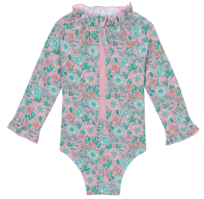 The Bonton Baby Girls' Combinette Swimsuit features long sleeves, a ruffled collar with cuffs, a pink and green floral print, front zipper, and built-in UV protection for safe, stylish sun play.