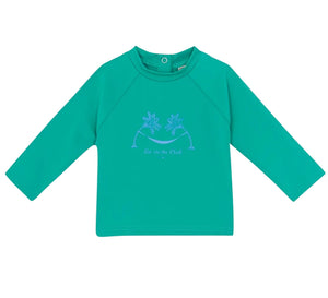 The Bonton Baby Rashguard is a green long-sleeve kids’ shirt with a round neck and front palm tree graphic—ideal as beachwear or a swim t-shirt for fun, sun-filled days.
