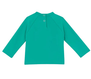 The Bonton Baby Rashguard is a teal kids’ beachwear swim t-shirt with long sleeves, anti-UV protection, and two back snaps at the neckline. Shown laid flat with the back facing up.