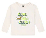 A cream long-sleeve Kids’ Taxi Cool T-Shirt by Bonton, made from 100% cotton, featuring “COOL KIDS CLUB!!” and a playful skateboarding dog graphic on the front.