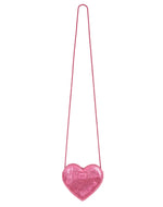 The Bonton Girls’ Leather Heart Bag—a petite pink purse with a long matching strap—stands out against a plain white background, making it the ideal accessory for any young fashionista.