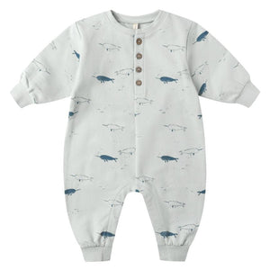The Quincy Mae Baby Boys' Relaxed Fleece Jumpsuit features long sleeves, ribbed cuffs, four snaps for easy changes, and a cute blue and grey narwhal print—perfect cozy fall wear for babies.