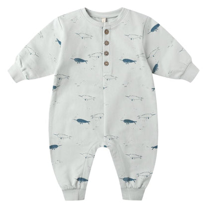 The Quincy Mae Baby Boys' Relaxed Fleece Jumpsuit features long sleeves, ribbed cuffs, four snaps for easy changes, and a cute blue and grey narwhal print—perfect cozy fall wear for babies.