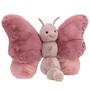 Beatrice Butterfly, a pink butterfly stuffed toy by Jellycat designs, on a white background.