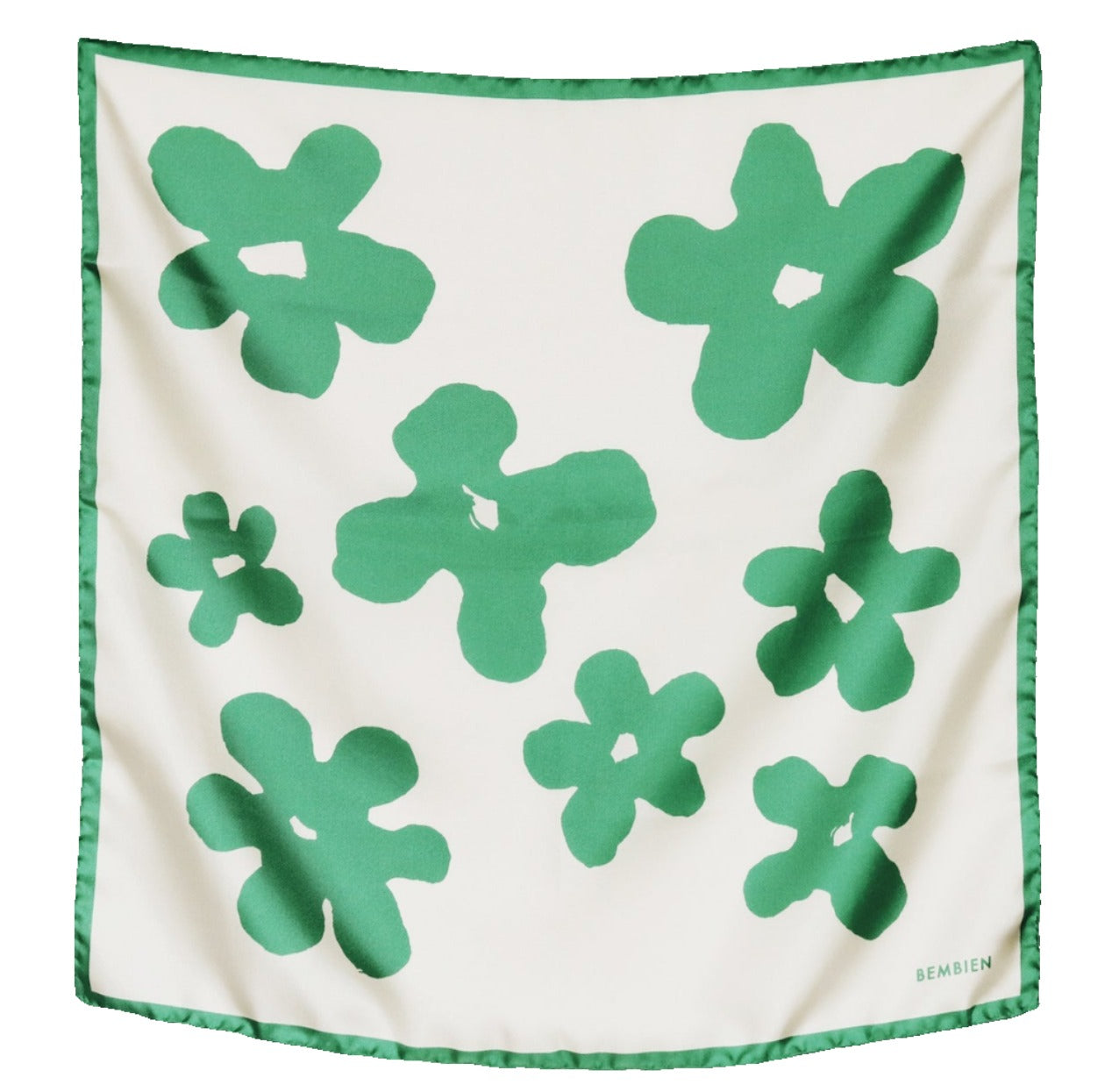 The Bembien Delfina Scarf is a silk twill square scarf showcasing a handprinted floral design with green abstract shapes on a white background. It is finished with a green border edge and crafted in Italy, making it an elegant addition to any outfit.