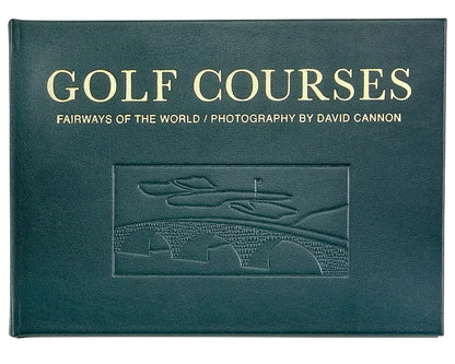 Dark green, landscape-oriented Golf Courses: Fairways of the World book featuring David Cannon’s photography, with gold text and an embossed illustration of a stone bridge and green.