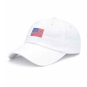 White baseball cap by Bits & Bows featuring a small embroidered American flag on the front, displayed against a plain white background. The American Flag Baseball Hat combines classic heritage style with everyday versatility, making it an ideal accessory for any outfit.